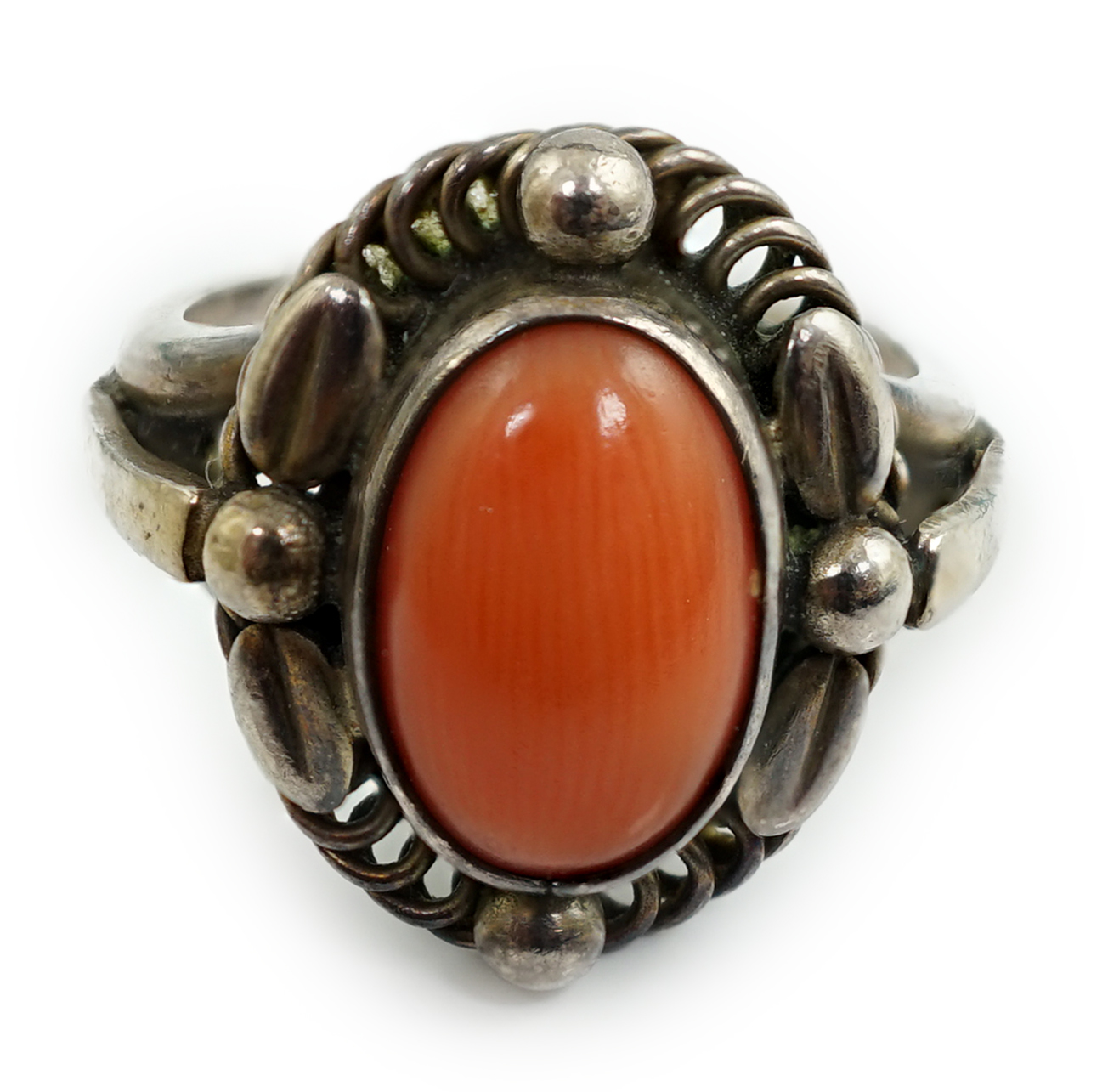 A Georg Jensen sterling silver and cabochon coral set ring, design no. 1A, size L. Condition - fair to good